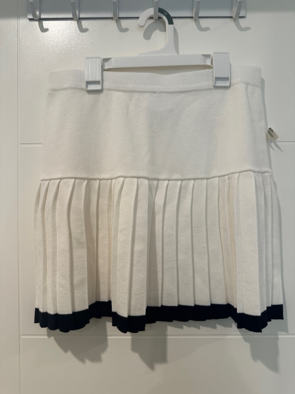 Freshman Cream Pleated Mini Skirt with Black Hem